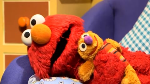 Le duele el estomago a Elmo cover image