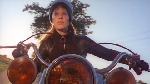 The girl on a motorcycle